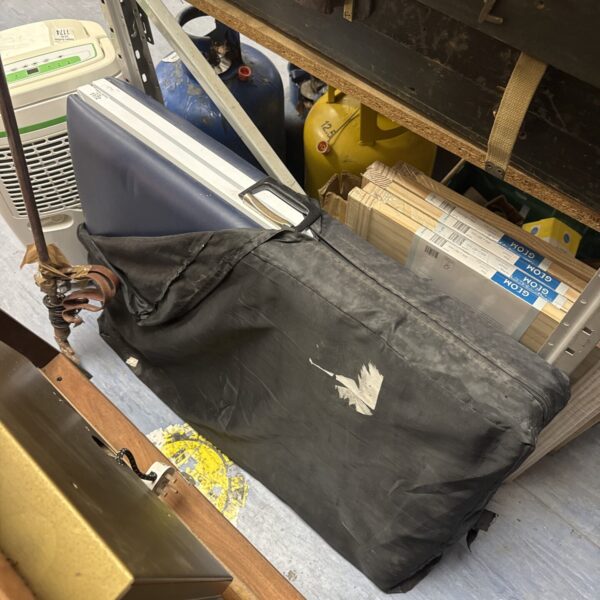 Padded folding massage table in used condition.