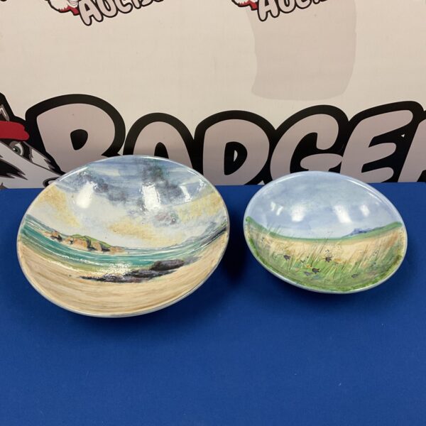 Highland stoneware bowls with scenic landscape painting.