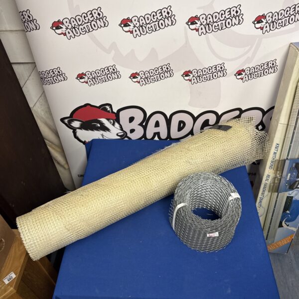 New roll of stainless steel mesh with roll of exterior fibreglass mesh