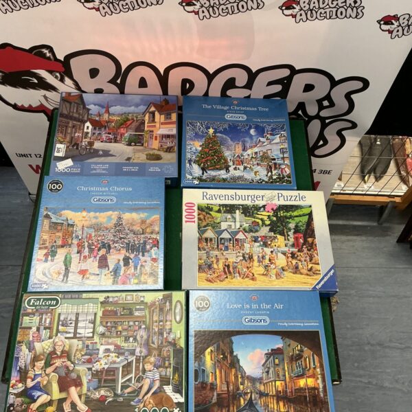 A collection of vintage jigsaw puzzles, including Falcon brand.