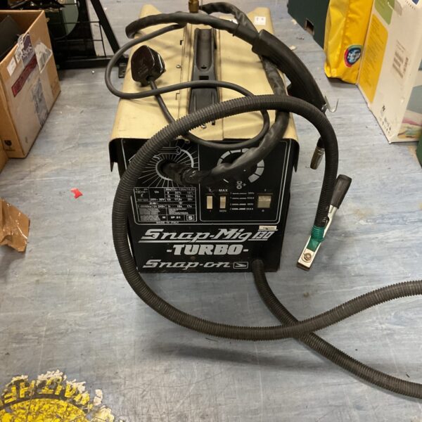 Vintage Lincoln Electric MIG welding machine for metal fabrication.