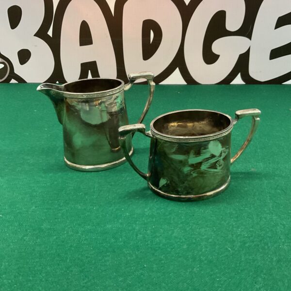 Vintage Mappin and Webb silverplate cream jug and sugar bowl set.