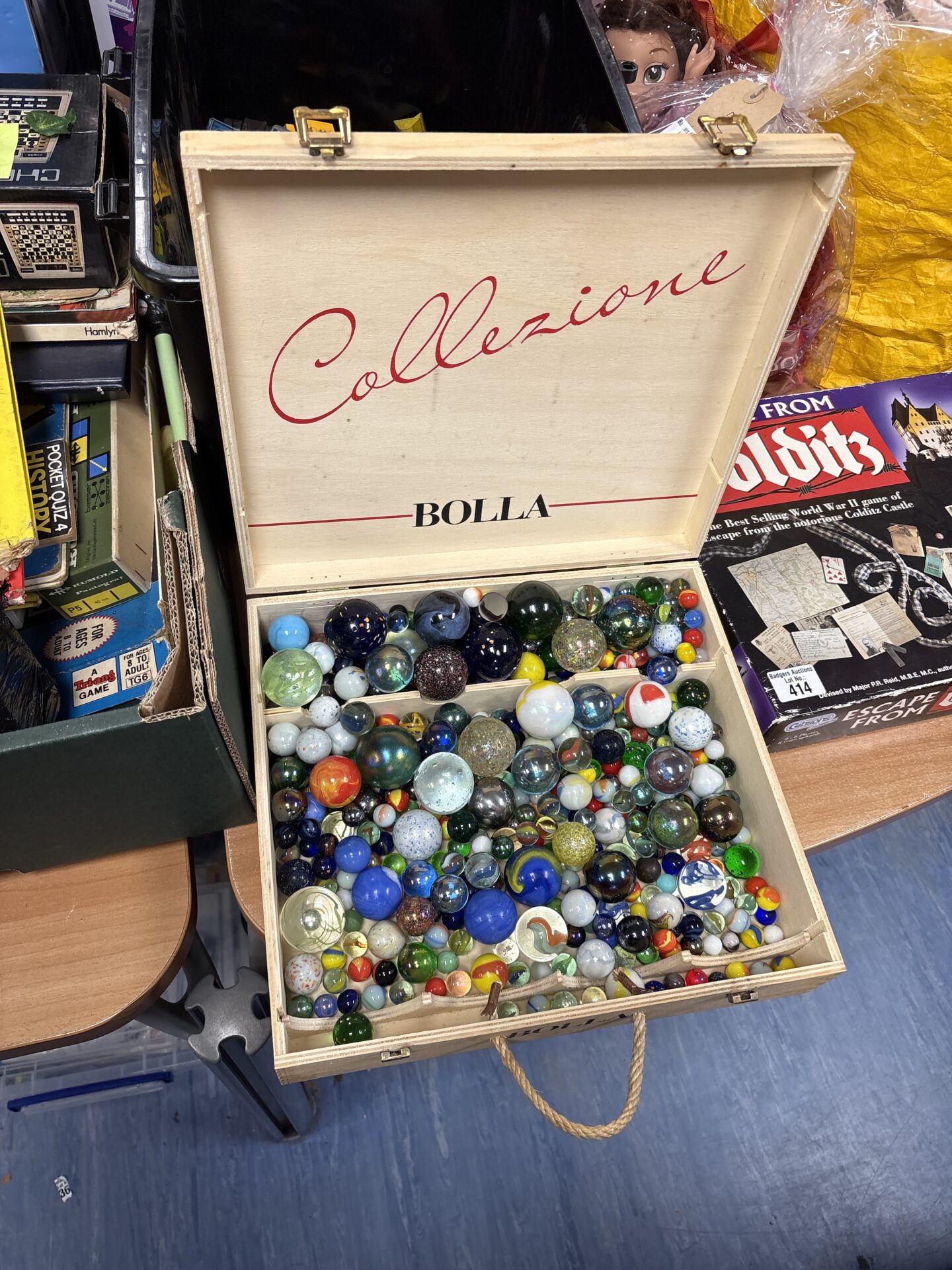 411 Collection of mixed sized marbles