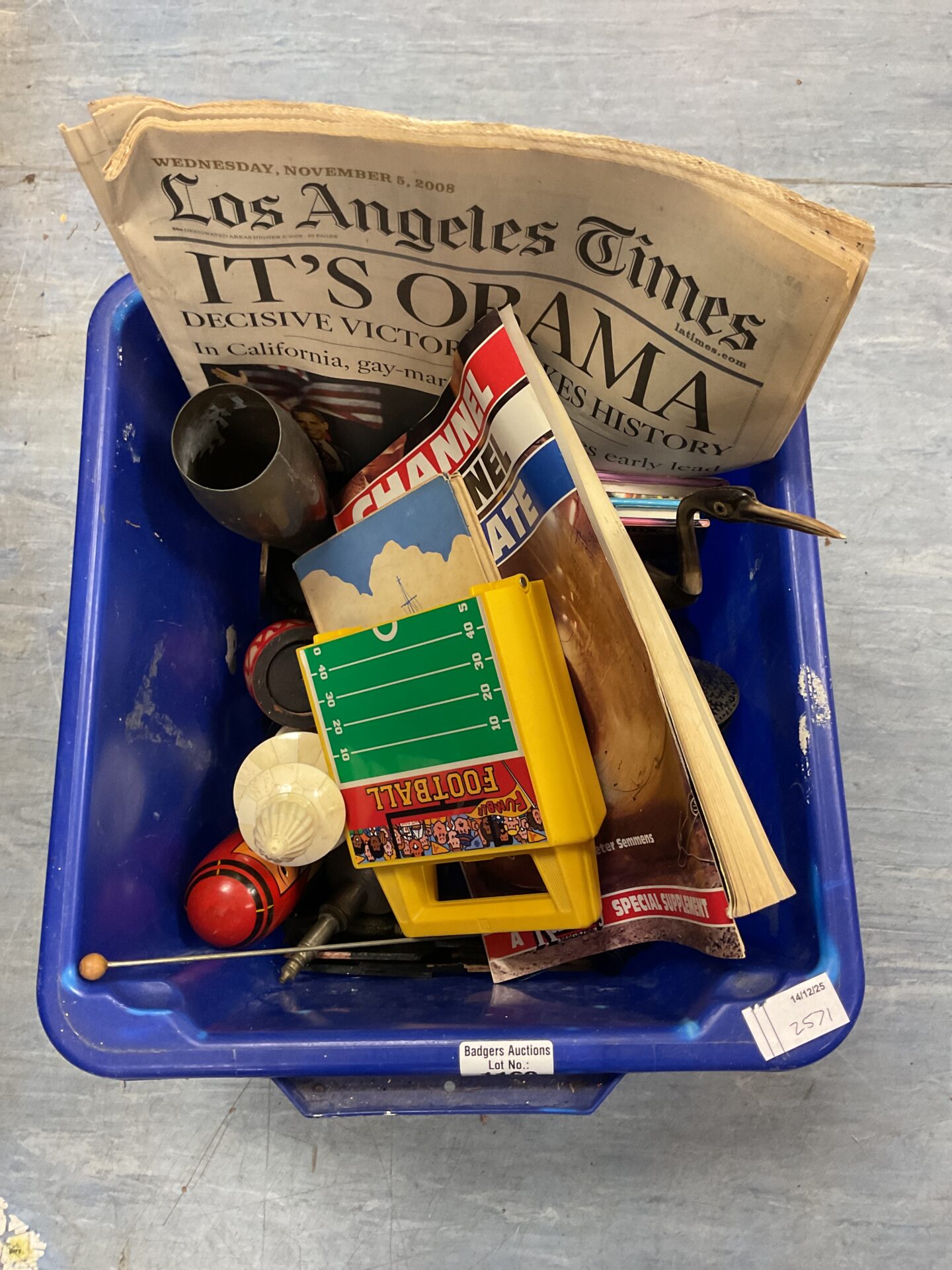 1046 Box of mixed inc LA times “IT’S OBAMA” 2008 newspaper and an antique Indian silver cup and cover