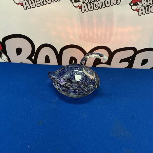 Vibrant Murano glass swan sculpture with blue and white swirls.