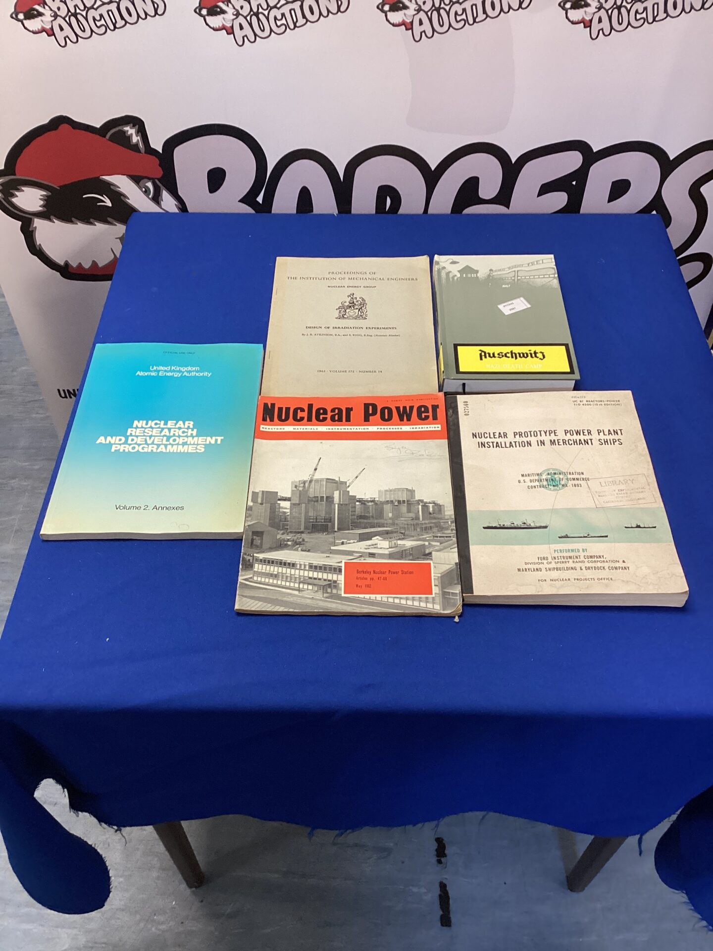 480 Three nuclear power plant related books, including nuclear research and development programs and nuclear prototype power plant installation in merchant ships along with a copy of Auschwitz Nazi death camp