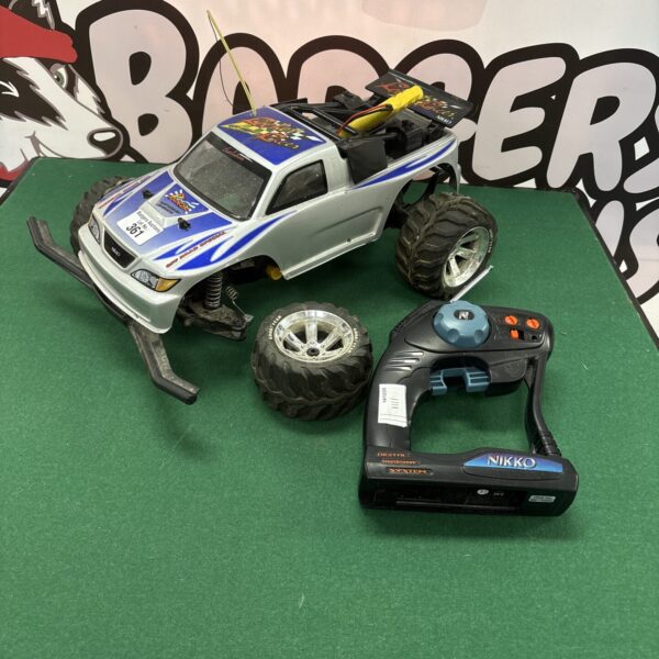 Vintage Roulet Racer RC buggy with remote control.