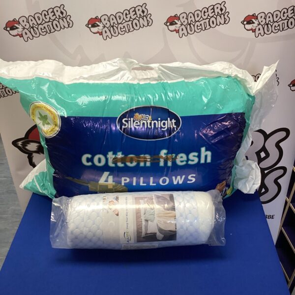 Pair of Silentnight cotton pillows for comfortable bedding.