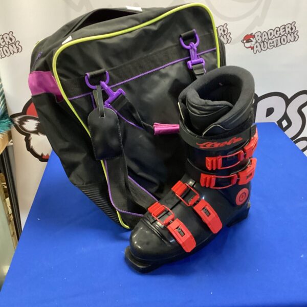 Pair of used ski boots in a Raechelle bag.