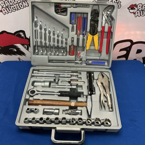 Open tool kit with various hand tools inside a plastic case.
