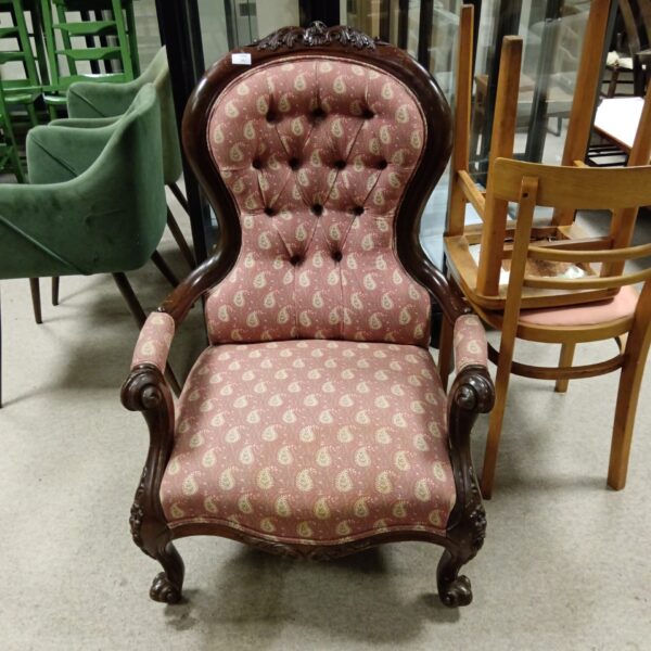 Victorian mahogany salon chair with paisley fabric upholstery.