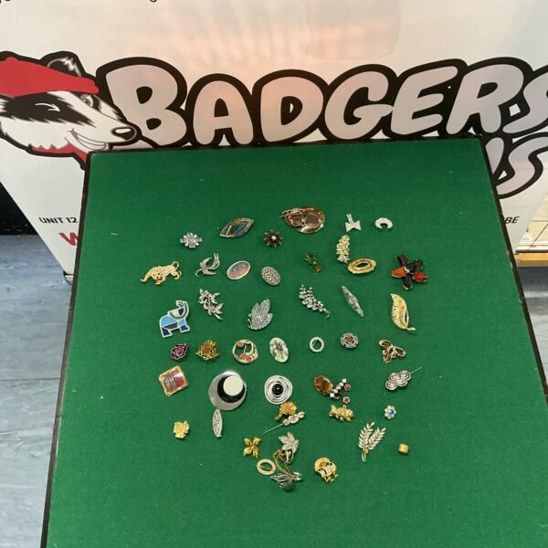 Vintage brooch and pin lot with colourful enamel details.