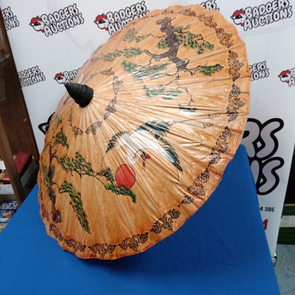 Vintage Chinese parasol with hand-painted bird and foliage design.