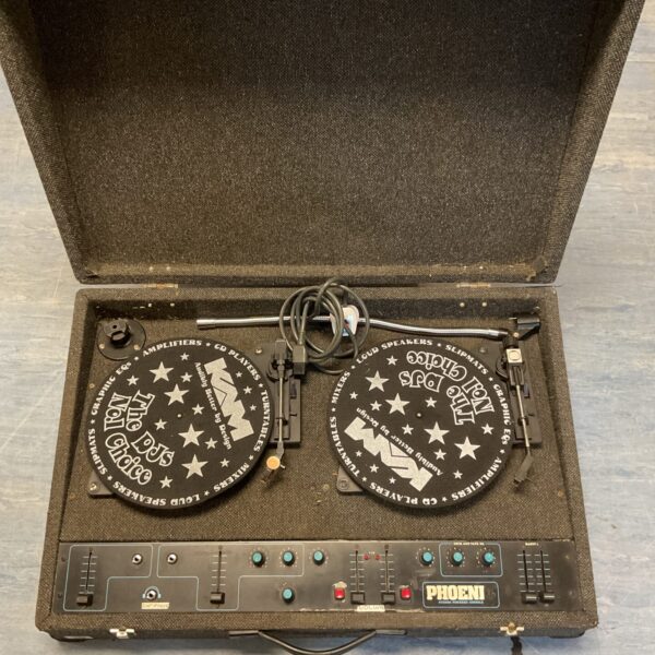 Vintage DJ Pheonix stereo console with knobs and sliders.