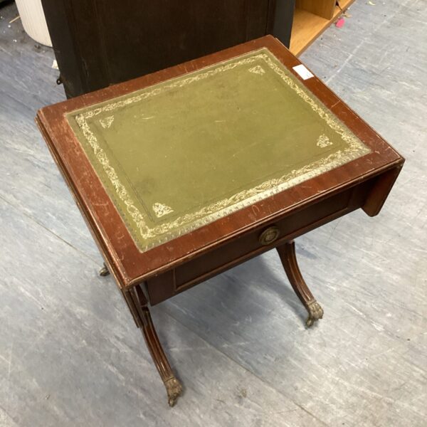 Vintage drop leaf side table with leather top and claw feet.