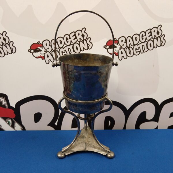 Vintage silver plate wine bottle bucket on stand.