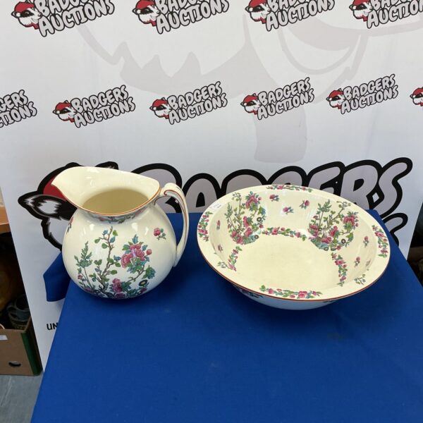Vintage floral porcelain wash bowl and jug set from 1935.