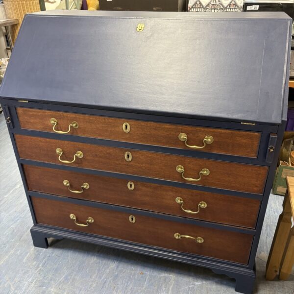 Front view of a vintage upcycled writing bureau with drawers.
