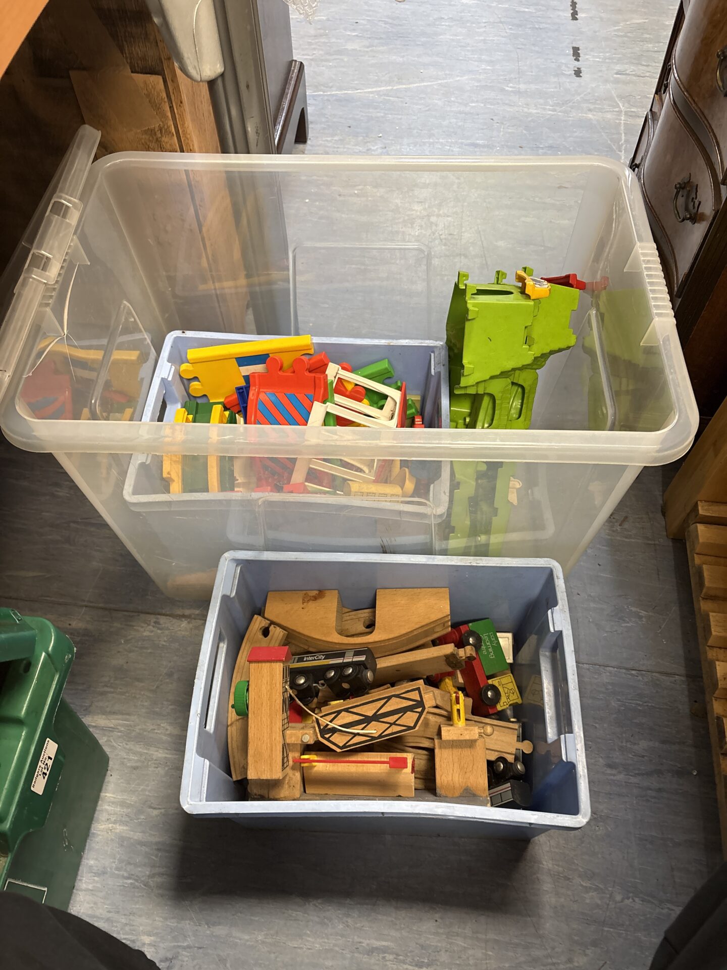 384 Two boxes of wooden trains and tracks inc elc
