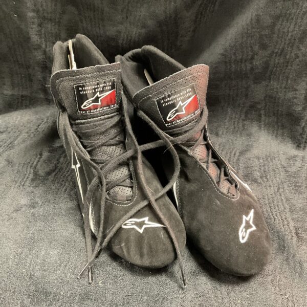 Pair of worn Alpinestars race shoes, motorsport footwear.
