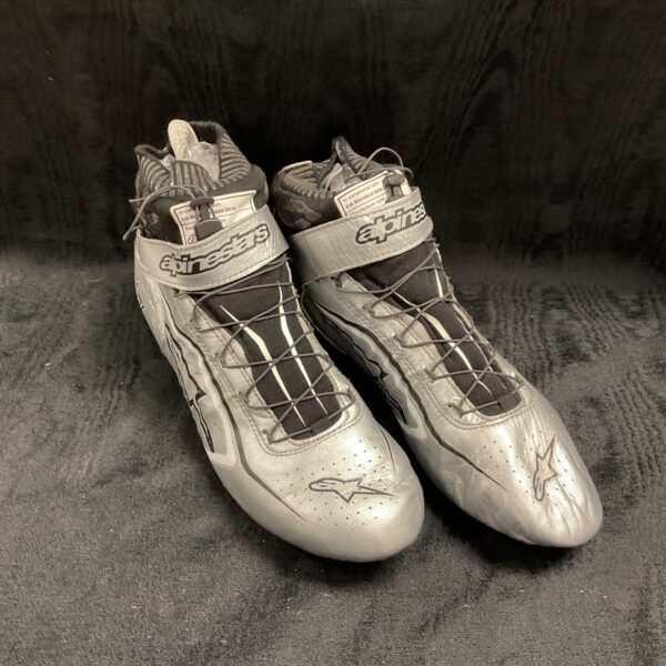 Silver Alpinstars race boots, size 9, showing wear.