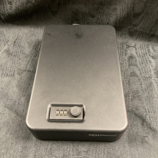 Amazon Basics metal pistol security case for secure handgun storage.