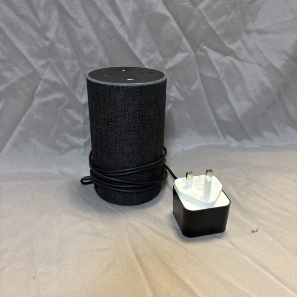 Black Amazon Echo Dot 3rd Generation smart speaker with power cable.