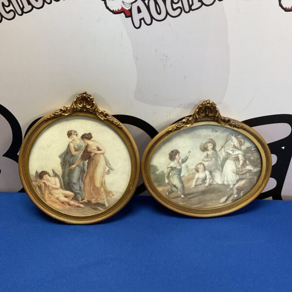 Antique pair of Angelica Kauffmann style classical prints in gilt frames.