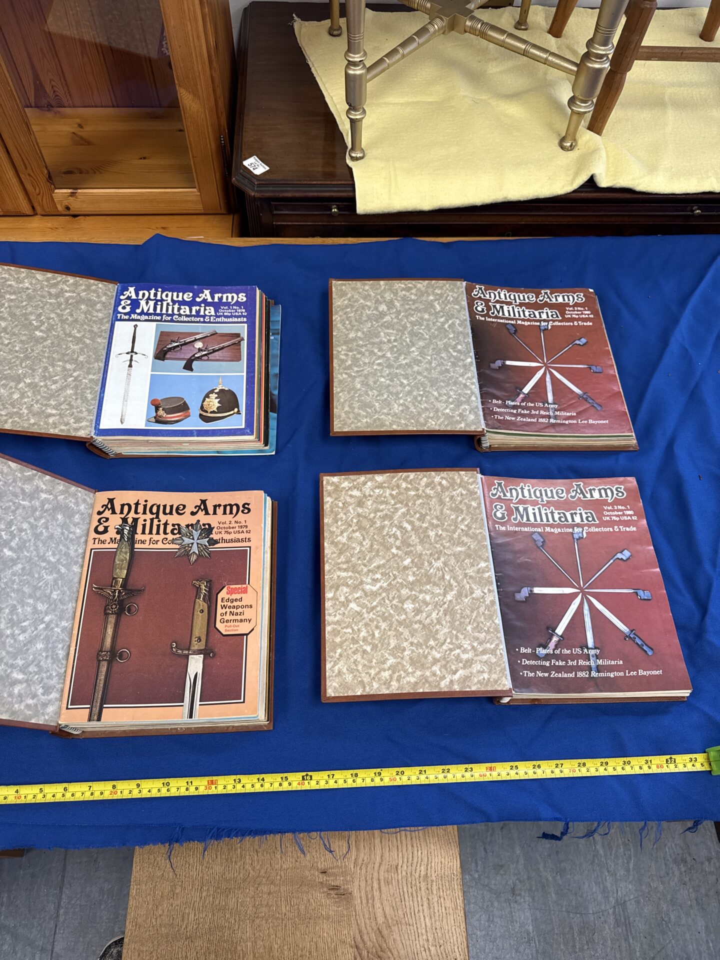 530 Four folders of 1970s/80s antique arms & militaria magazines