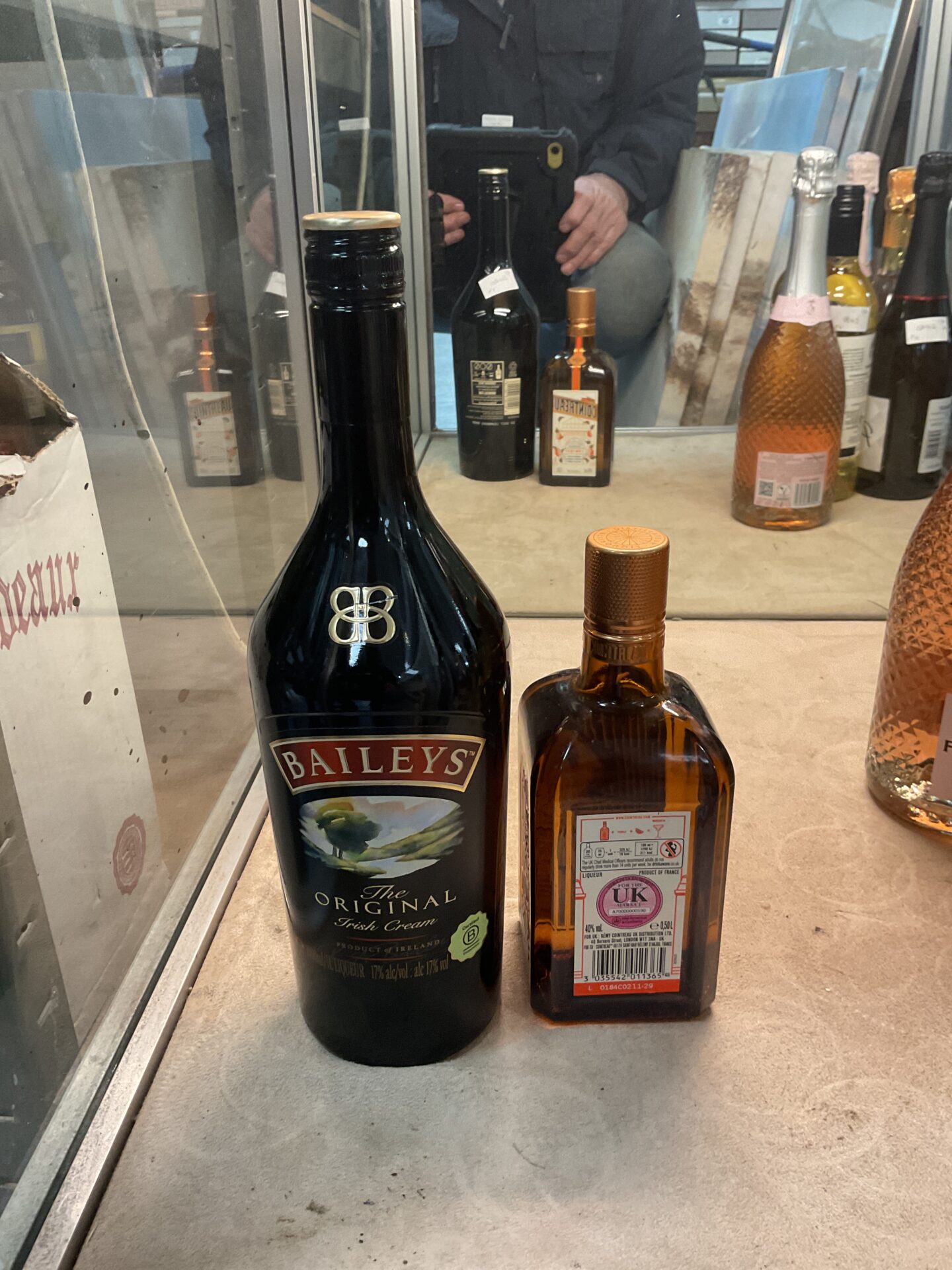 907 1 L bottle of Baileys original Irish cream and a 50 cL bottle of Cointreau