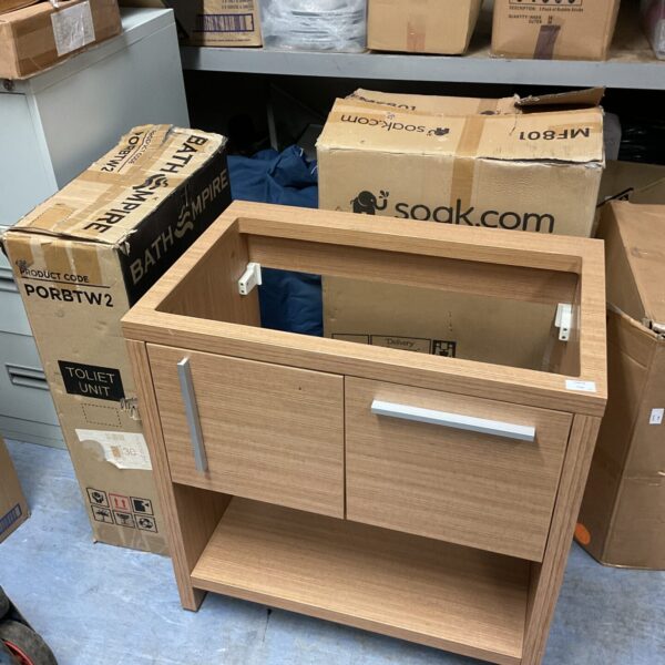 New bathroom units in original packaging, ready for installation.