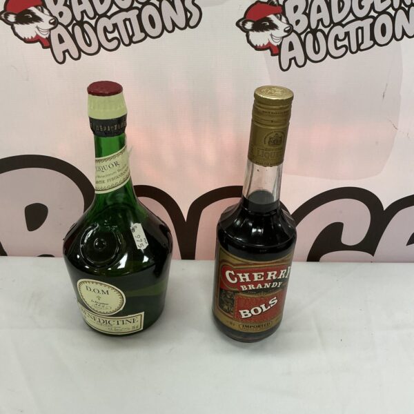 Vintage Benedictine and Cherry Brandy bottles for collectors.