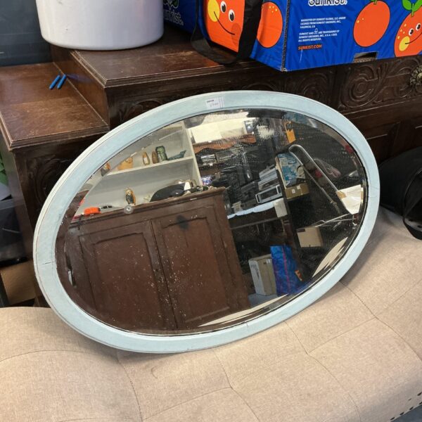 Vintage bevel edge framed mirror for home decor.