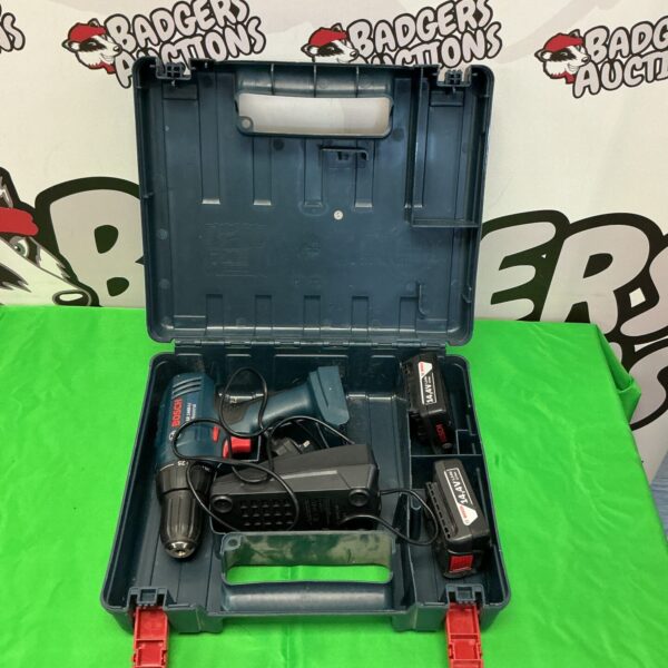 Open carry case showing a Bosch battery drill set with batteries.