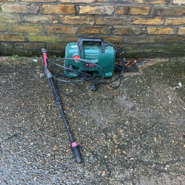 Used Bosch power washer for garden and patio cleaning.