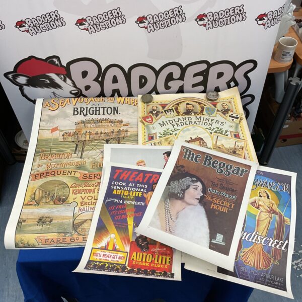 Vintage poster collection featuring Brighton and other colourful advertisements.