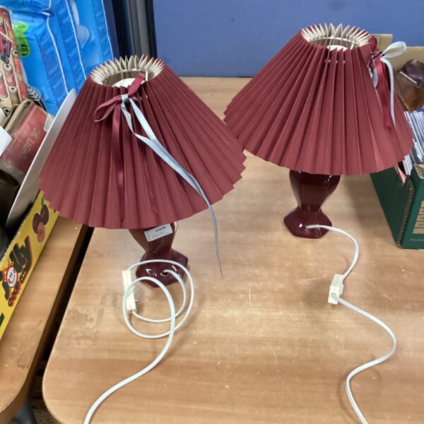 Pair of vintage burgundy table lamps with pleated shades.