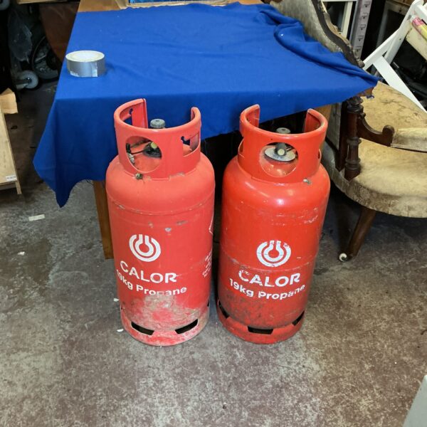 Two empty 19kg Calor Propane gas bottles for sale.