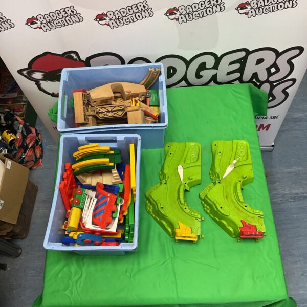 Childrens toy train sets including a Brio set in a box.