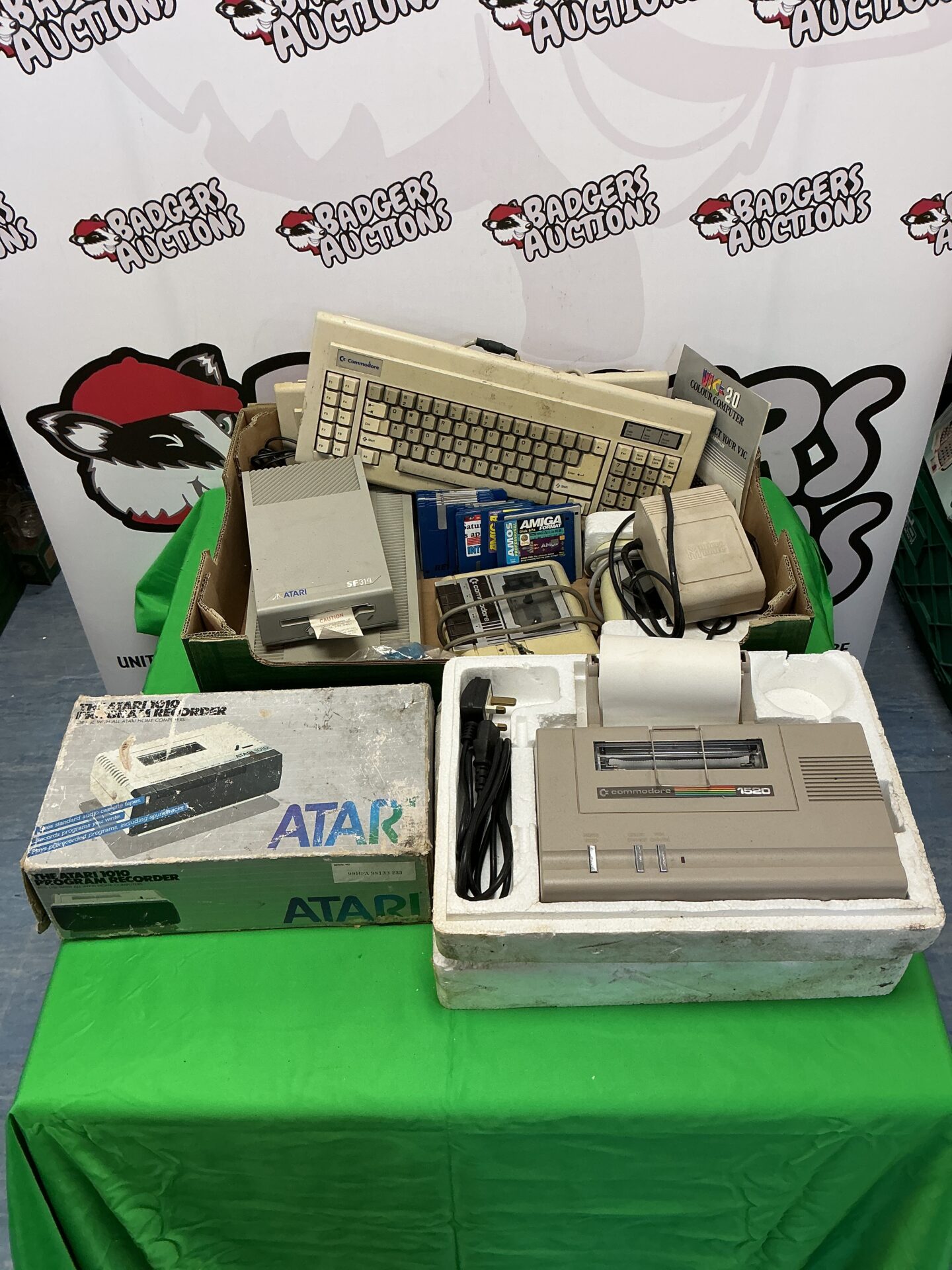 243 Tray of commodore & Atari hardware & games including disk drives, keyboards & printer