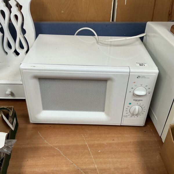 White Daewoo microwave oven, vintage kitchen appliance.