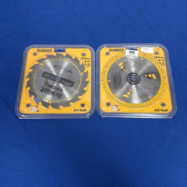 Pair of new Dewalt 184mm Nailtough cutting disks in packaging.