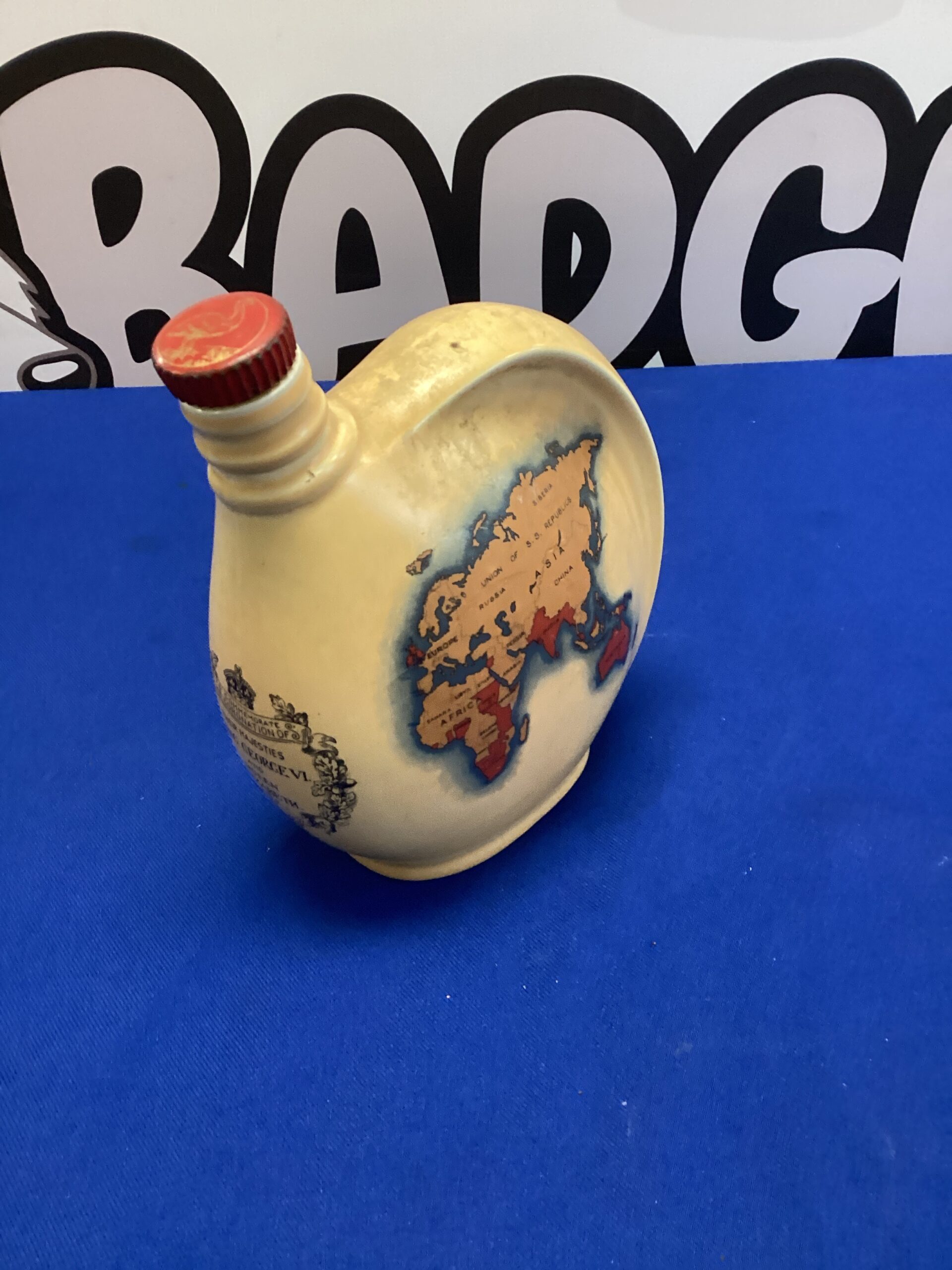 253 Emu Australian wines wine bottle to commemorate the coronation of their Majesty King George Sixth and Queen Elizabeth May 2, 1973