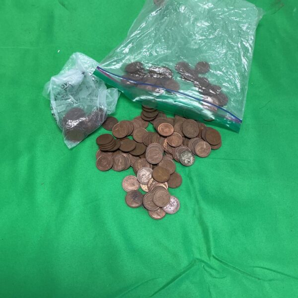 Quantity of vintage British half penny coins for collectors.