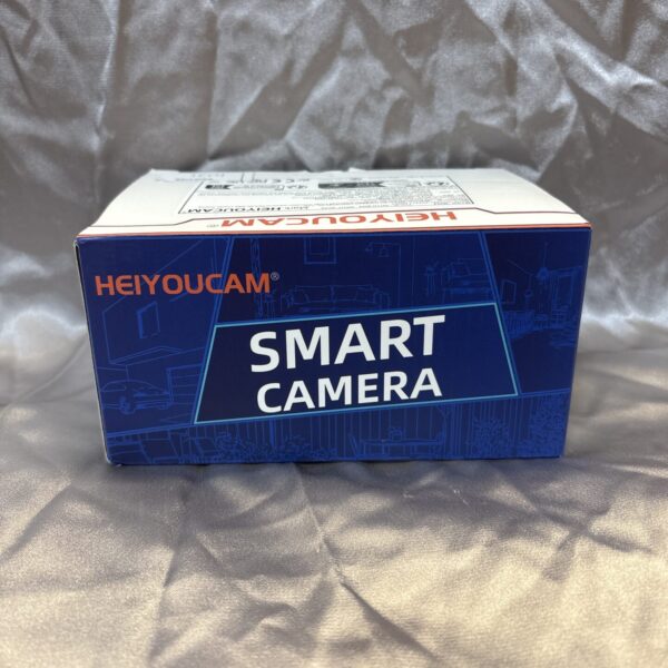 Heiyoucam smart camera in original packaging for home security.
