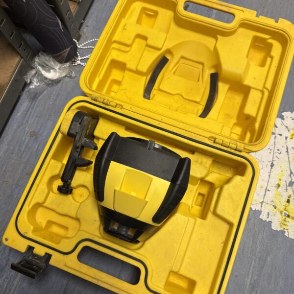 Yellow carrying case containing a Leica Rugby 50 laser level.