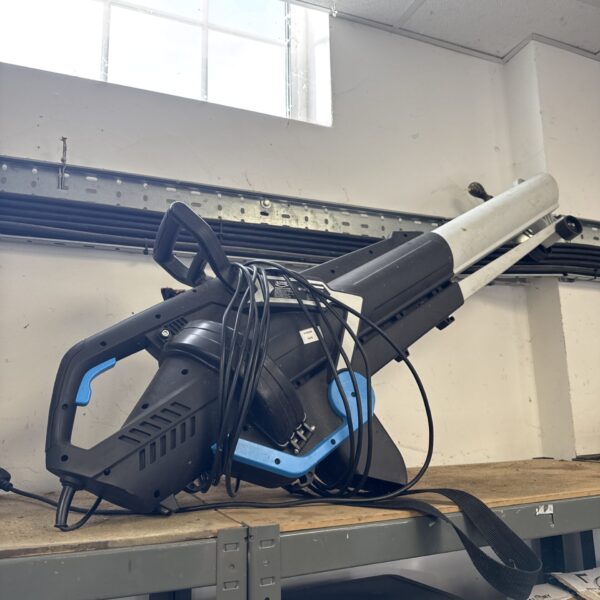 Used Mac Allister electric leaf blower for garden cleaning and debris removal.