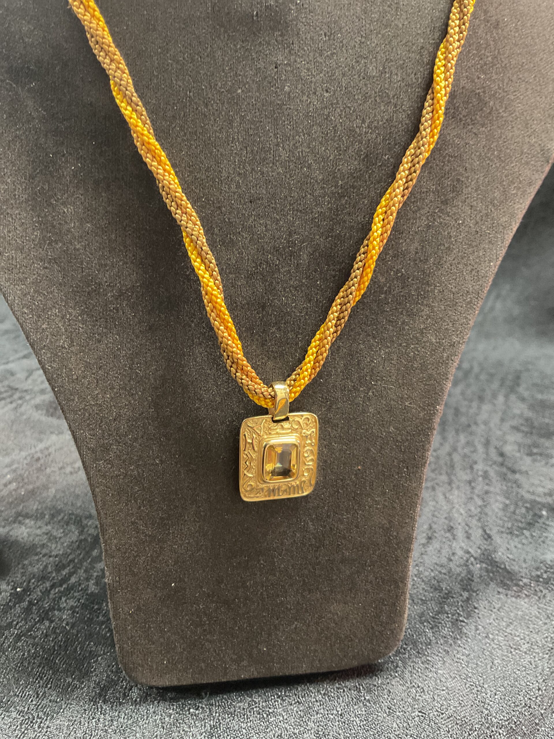 915 matis 18ct gold pendant set with madeira citrine on rope twist necklace with 18ct gold clasp,pendant weighs 6g gross