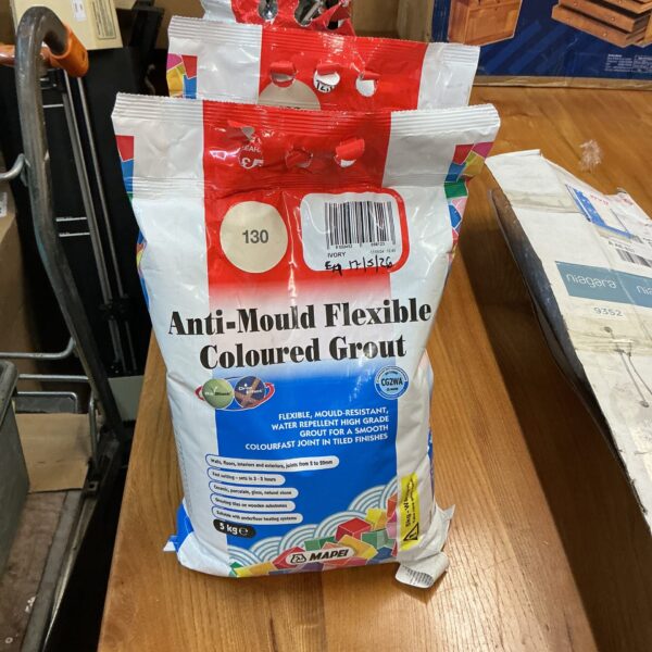 Mapei flexible anti-mould grout in ivory colour, unopened bags.
