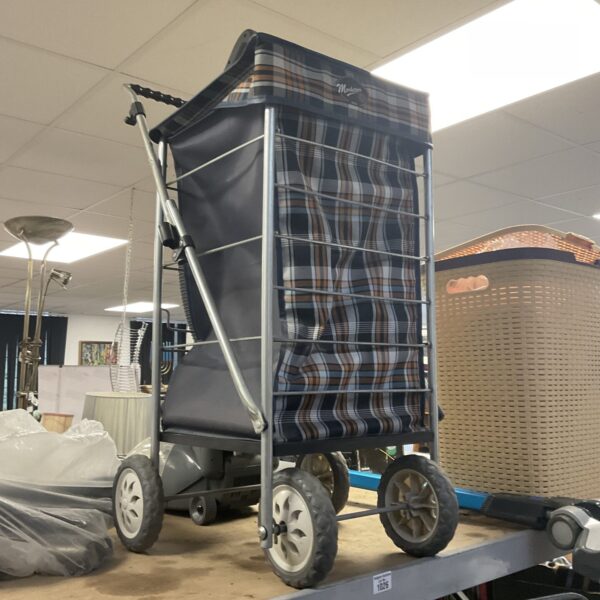 Vintage Marketeer shopping trolley with patterned fabric bag.